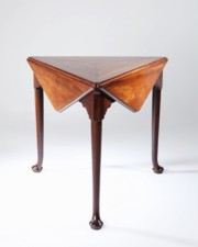 A rare George II period mahogany 'handkerchief' drop leaf table.