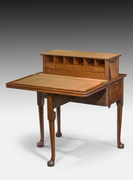 A fine and rare George II period mahogany harlequin table.